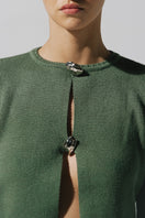 Baobab Meraky sweater in sage green, cozy knit sweater with a relaxed fit and ribbed cuffs, perfect for casual wear.