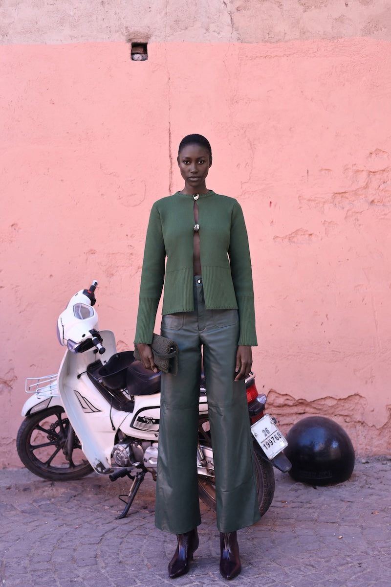 Baobab Meraky sweater in sage green, soft knit sweater with a cozy fit and ribbed cuffs, perfect for casual wear.