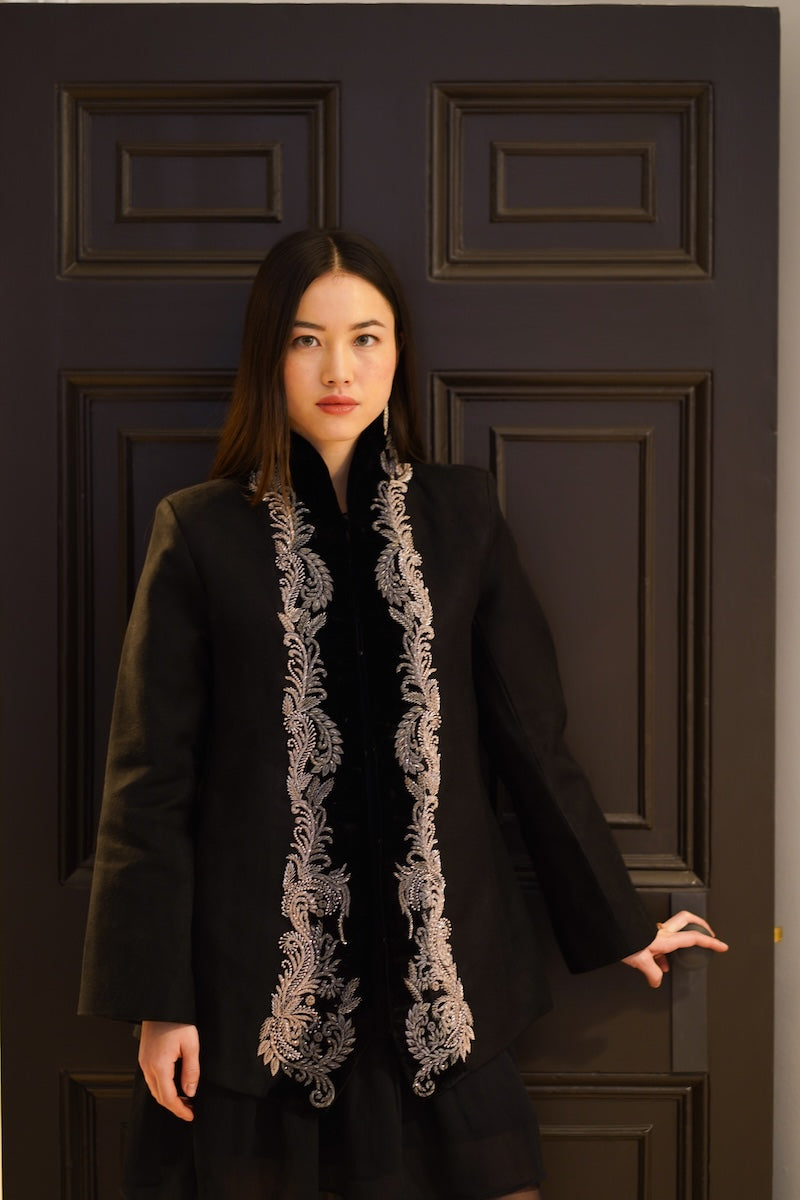 Nadya Shah Mercurial Jacket front view showing lightweight black jacket with sleek design and zip closure.