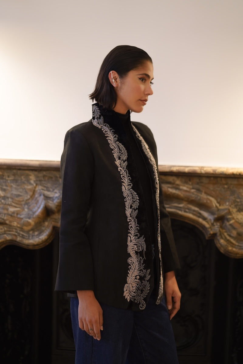 Nadya Shah Mercurial jacket shown from the side, featuring a sleek design and lightweight fabric perfect for outdoor wear.
