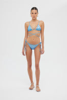Shiny blue Meri bikini set by Maliluha featuring a two-piece design with adjustable straps and matching bottom.