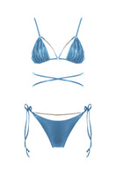 Shiny blue Meri bikini set by Maliluha featuring a stylish two-piece swimwear with a halter top and matching bottoms.