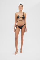 Black shiny Meri bikini set by Maliluha with minimal coverage, featuring sleek fabric and stylish design for beach or poolwear.
