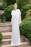 Elegant I.H.F mermaid gown with high neck and gathered waist, featuring a fitted design and flowing silhouette.