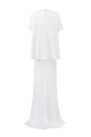 Elegant I.H.F mermaid gown with high neck and gathered waist, featuring a fitted silhouette and flowing skirt.