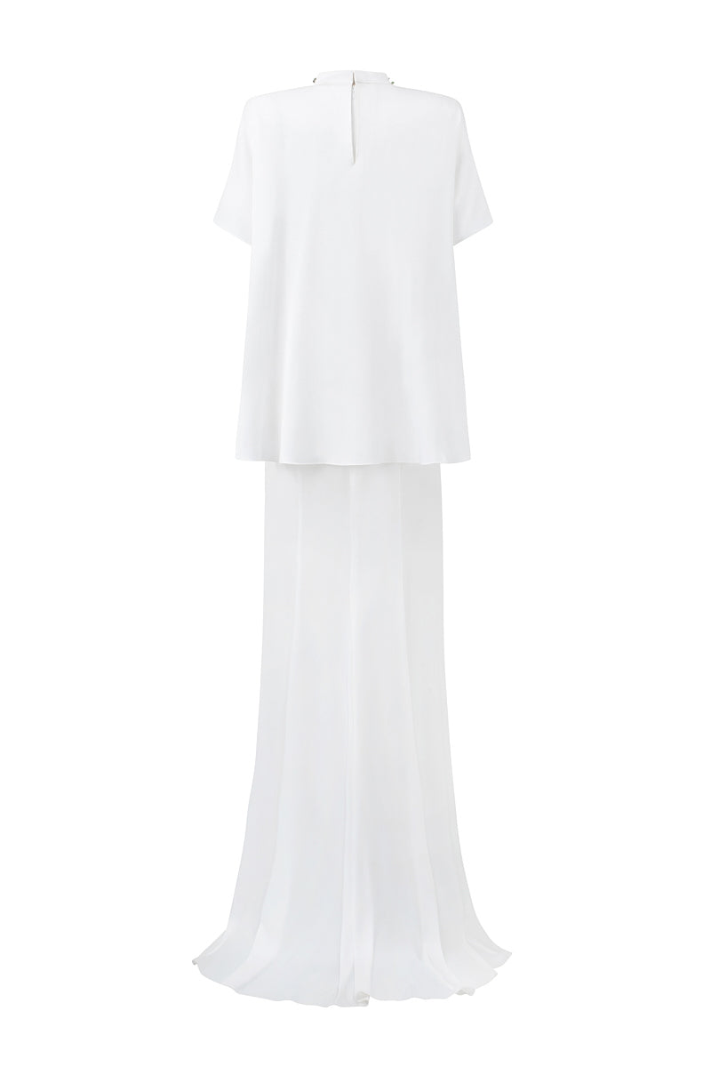 Elegant I.H.F mermaid gown with high neck and gathered waist, featuring a fitted silhouette and flowing skirt.