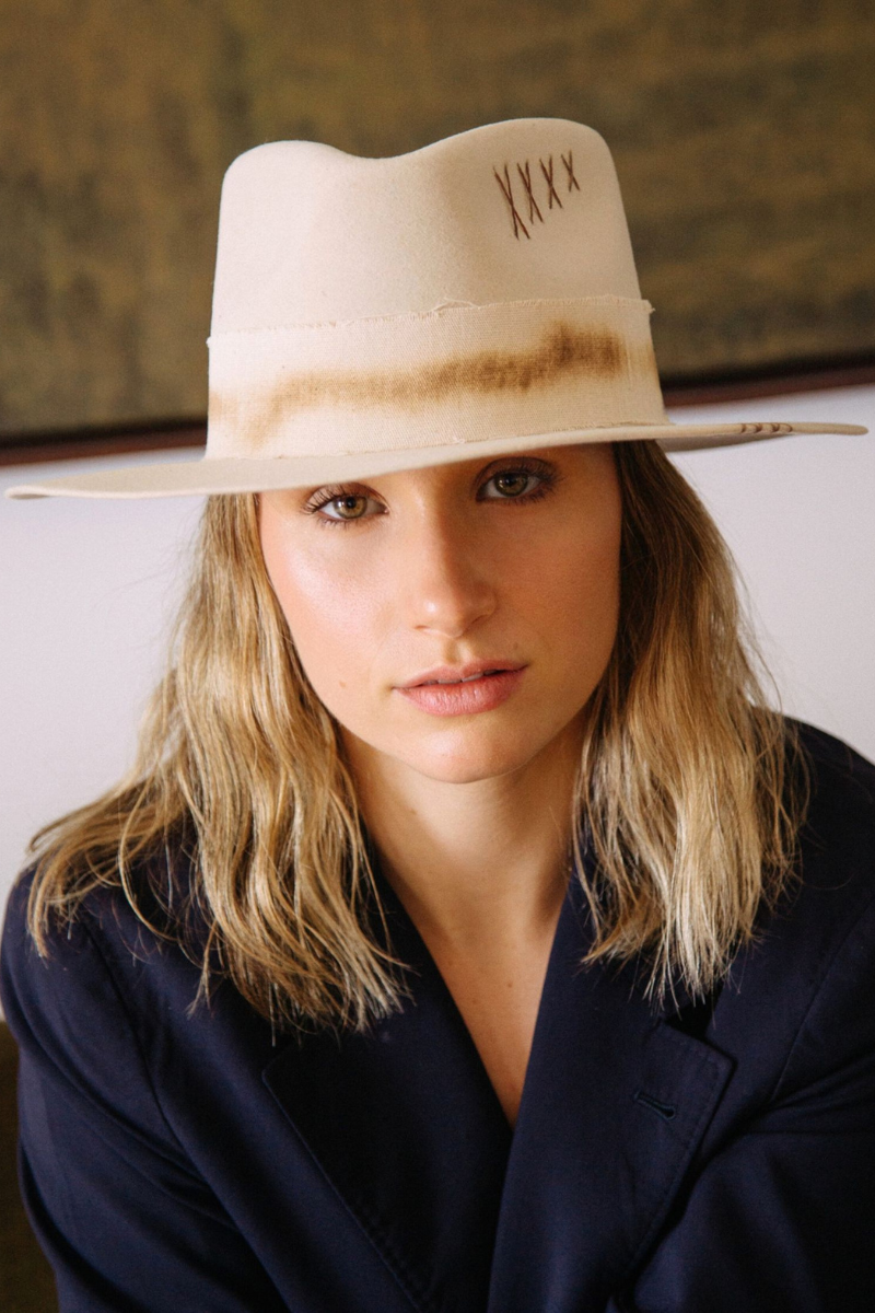 Modern Monarchie Michael hat featuring a stylish bone-colored design, perfect for casual or fashionable wear.