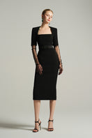 Black knee-length midi dress by I.H.F Studio featuring a trapezium neckline and dark green crystal-embellished bow belt.