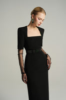 Black knee-length midi dress by I.H.F Studio featuring a trapezium neckline and a dark green crystal-embellished bow belt.