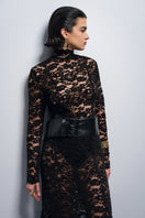 Black maxi dress by Nana Gotti, Midnight in Manhattan style, featuring a flowing silhouette and elegant design.