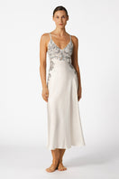 Elegant ivory silk bridal nightgown by NK IMODE featuring a flowing long design with delicate lace details.