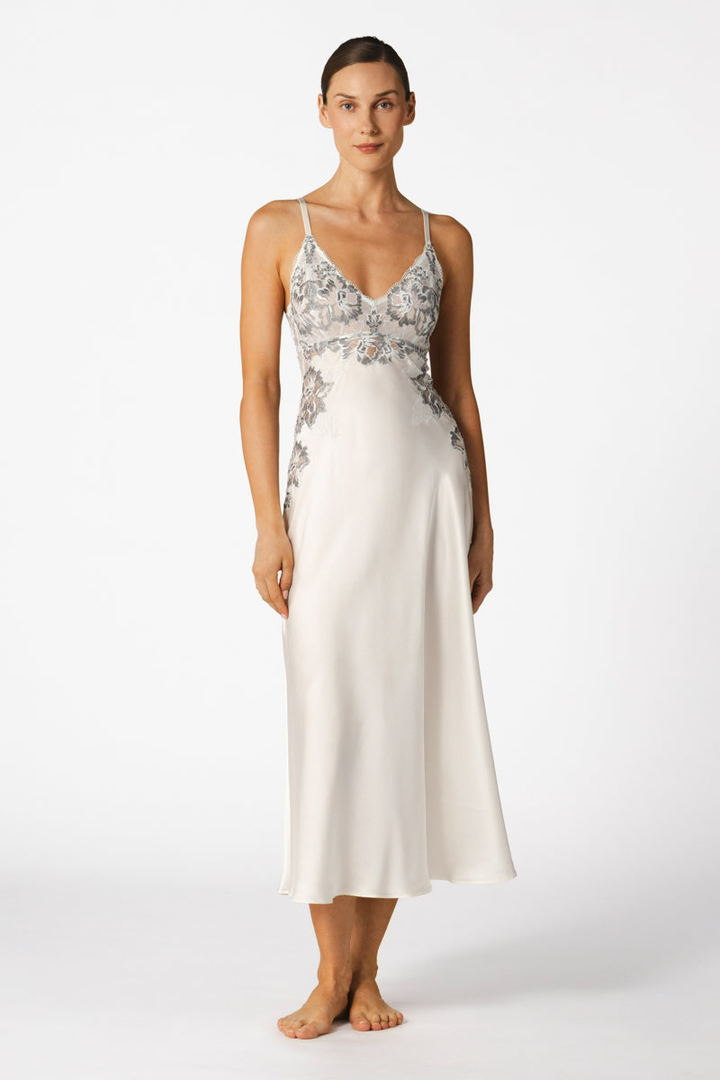 Elegant ivory silk bridal nightgown by NK IMODE featuring a flowing long design with delicate lace details.