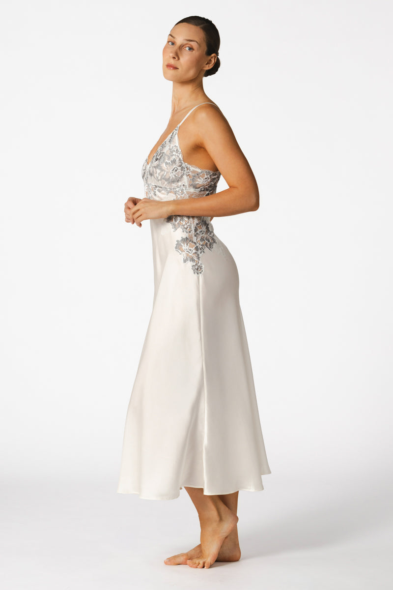 Ivory silk bridal nightgown by NK IMODE featuring elegant, flowing fabric and delicate detailing, perfect for a wedding night.