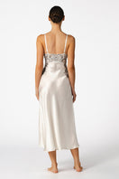 Ivory silk bridal nightgown by NK IMODE featuring elegant long design, delicate fabric, and intricate lace details.