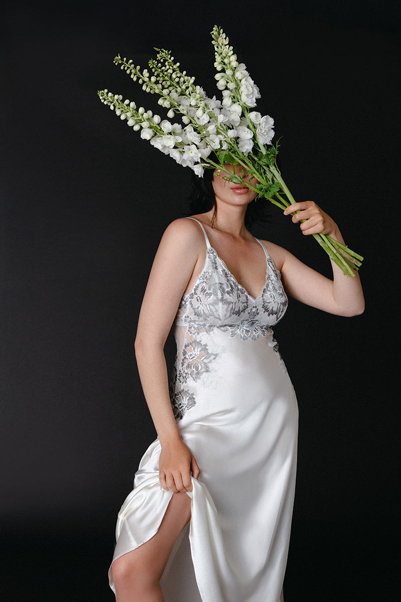Ivory silk bridal nightgown by NK IMODE featuring elegant, flowing fabric and delicate design, ideal for special wedding nights.