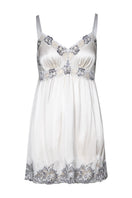 Ivory silk bridal baby doll chemise by NK IMODE, featuring delicate lace details and a soft, flowing nightgown design.