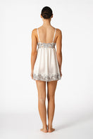 Ivory silk bridal baby doll chemise by NK IMODE, featuring delicate lace details and a soft, flowing fit.