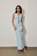 Summer Away EVIA baby blue top, casual sleeveless blouse with a relaxed fit, shown with a matching skirt in the image.