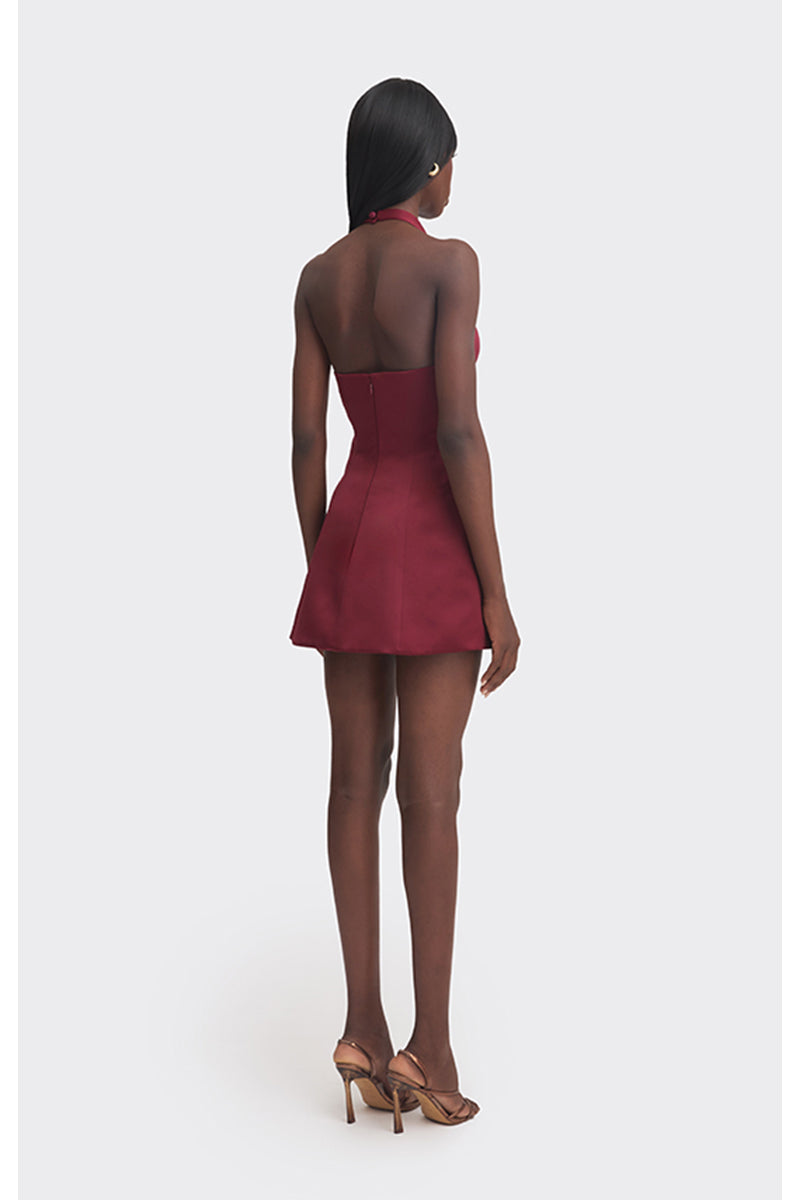 Burgundy mini bow dress from Stolen Stores, featuring a stylish short dress with a bow detail and fitted silhouette.