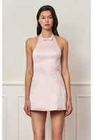 Light pink mini bow dress by Stolen Stores, featuring a stylish sleeveless design and a cute bow detail at the waist.