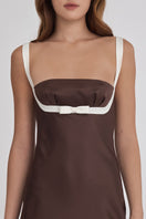 Dark brown mini bow gown by Stolen Stores featuring a stylish design, perfect for elegant occasions.