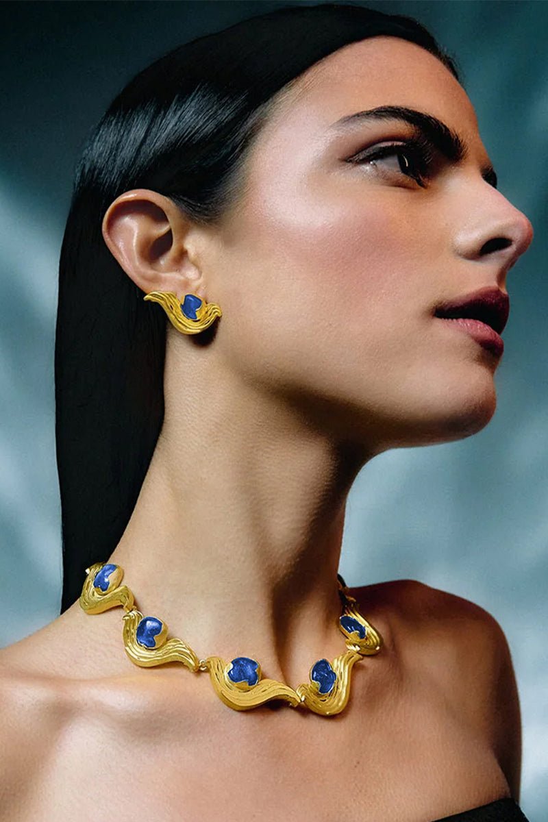 Mini blue meteorite earrings by Jude Benhalim, featuring small, polished meteorite stones in a sleek earring design.