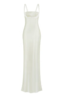 Light yellow maxi dress by Stolen Stores featuring a mini bow detail, perfect for casual or summer wear.