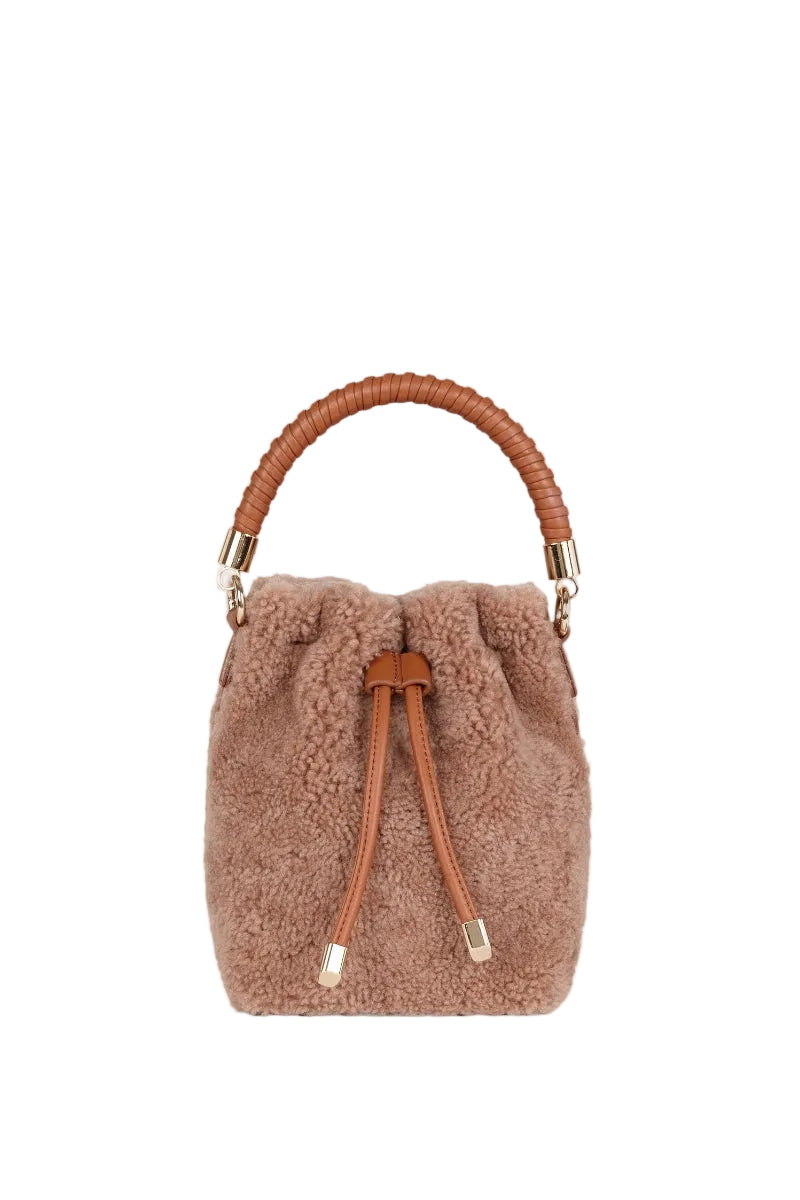 Saonara mini bucket top handle bag in caramel cozy leather, featuring a compact design with a stylish, soft finish.