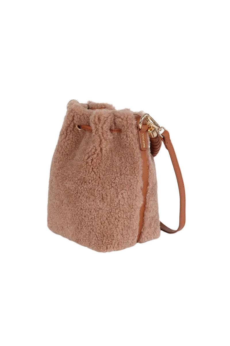 Saonara mini bucket top handle bag in cozy caramel color with a sleek design and compact size.