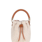 Saonara mini bucket top handle bag in off-white cozy fabric, showcasing its compact design and stylish texture.
