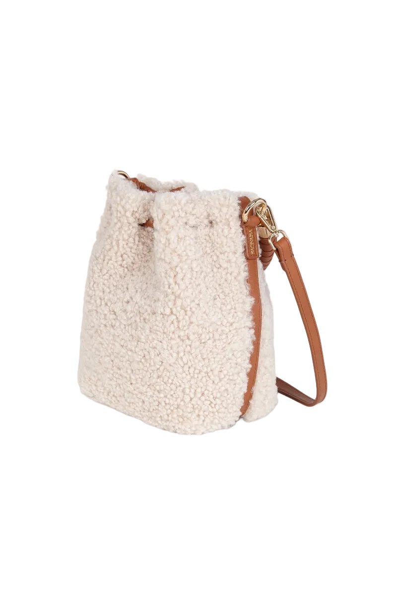 Saonara mini bucket top handle bag in off-white cozy fabric, featuring a compact design with a stylish, soft appearance.