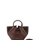 Mini Saonara Capazo bag in chocolate leather, featuring a compact top handle design and stylish craftsmanship.