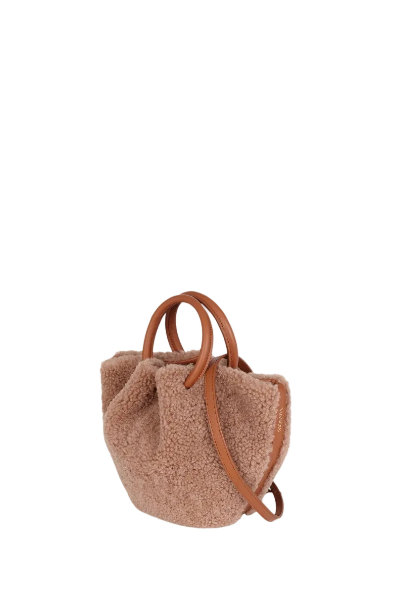 Saonara Mini Capazo Cozy top handle bag in caramel color with woven texture and rounded shape, stylish and compact for everyday use.