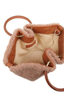 Saonara Mini Capazo in caramel cozy, top handle bag with a compact, stylish design and textured surface.