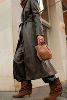Saonara Mini Capazo Cozy top handle bag in caramel color with woven texture and compact design.
