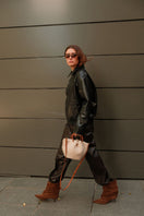 Mini Capazo Cozy off-white top handle bag by Saonara, featuring a compact design with soft, cozy material and elegant handles.