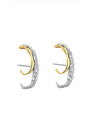 Mini Harmonia earrings by Jude Benhalim featuring small, mixed metal hoop and stud designs displayed on a white background.