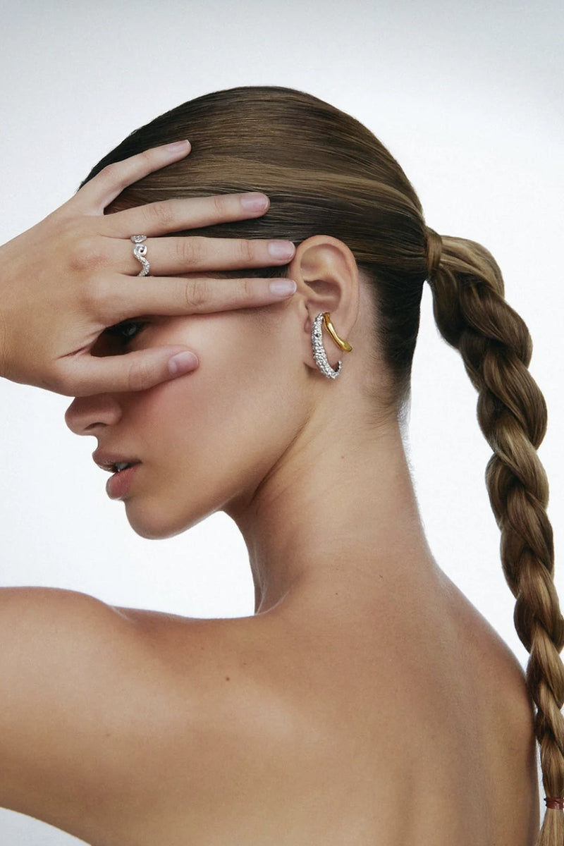Mini Harmonia earrings by Jude Benhalim, showing small, stylish mixed metal earrings with intricate design details.