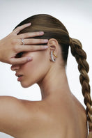 Mini Harmonia earrings by Jude Benhalim, showing small, stylish mixed metal earrings with intricate design details.