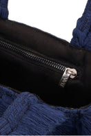 Navy blue mini Poka top handle bag by Bani with a structured design and short top handle, perfect for stylish everyday use.