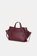 Saonara mini shopping shoulder bag in berry leather with a compact design and top handle, perfect for stylish everyday use.