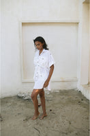 White Minita blouse by ANA + MARIA, showing a stylish, lightweight tops design with a relaxed fit and soft fabric.