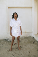 White Minita blouse by ANA + MARIA, lightweight tops with a relaxed fit, shown on a hanger against a neutral background.