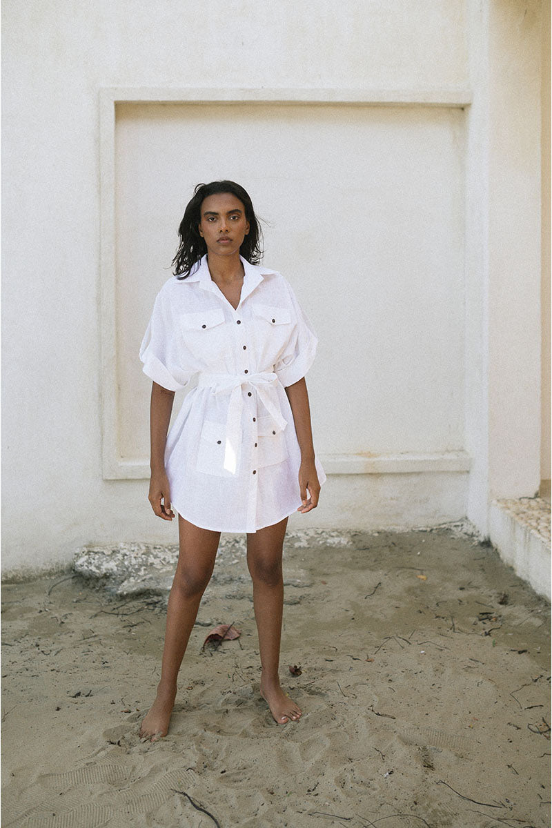 White Minita blouse by ANA + MARIA, lightweight tops with a relaxed fit, shown on a hanger against a neutral background.