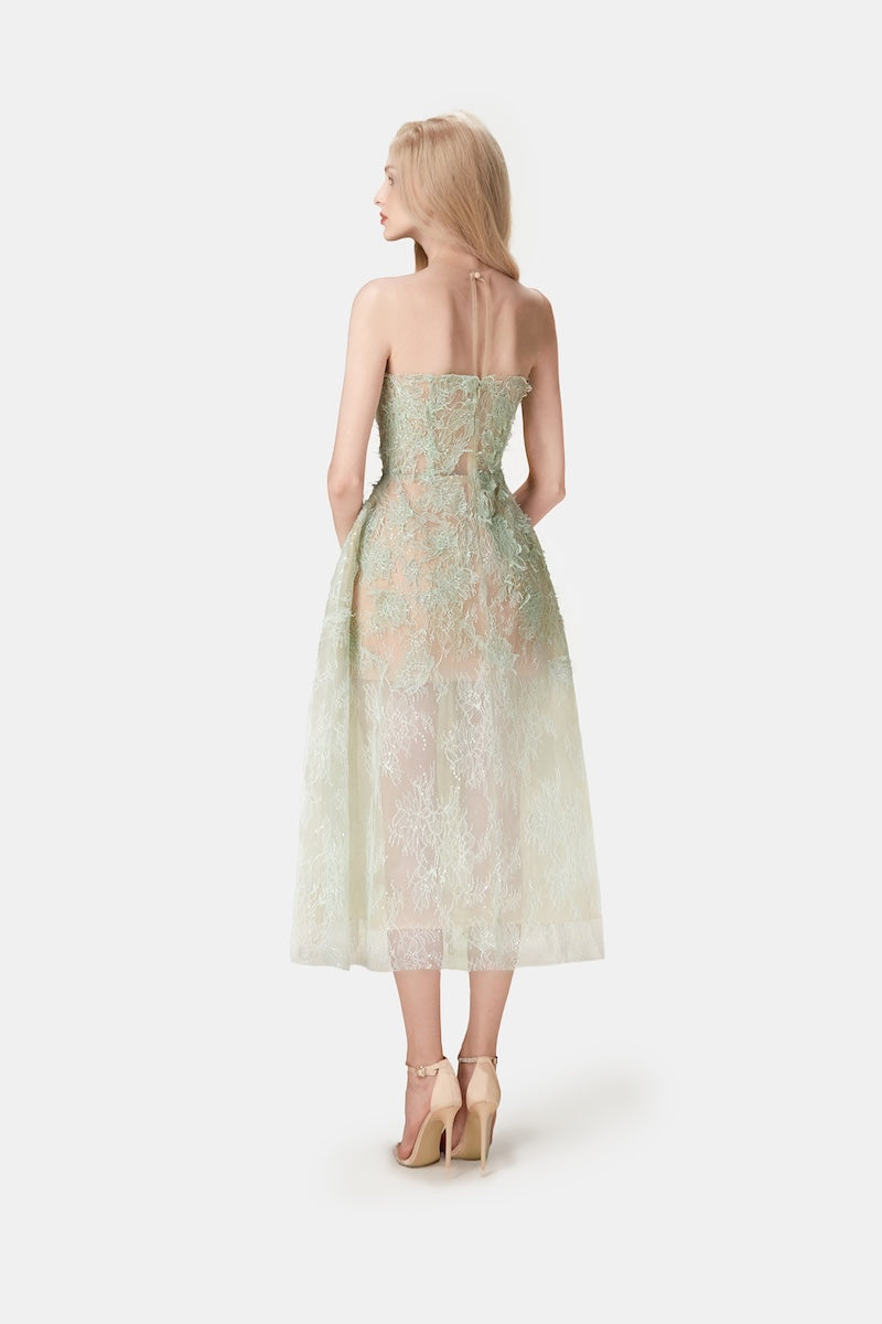 Mint beaded lace midi dress by Montsand, featuring intricate beadwork and elegant lace fabric, styled for formal occasions.