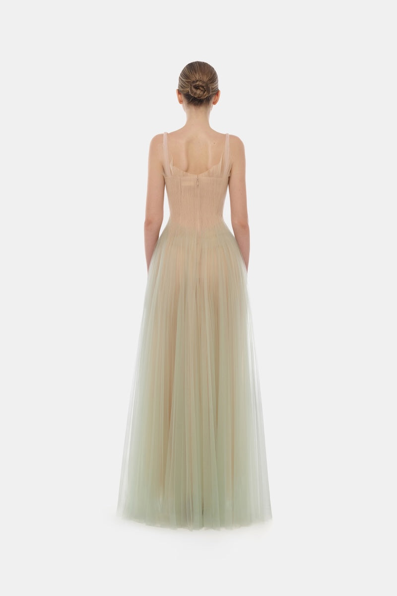 Mint corset tulle gown by Montsand, featuring a flowing tulle design and fitted bodice for elegant formal wear.