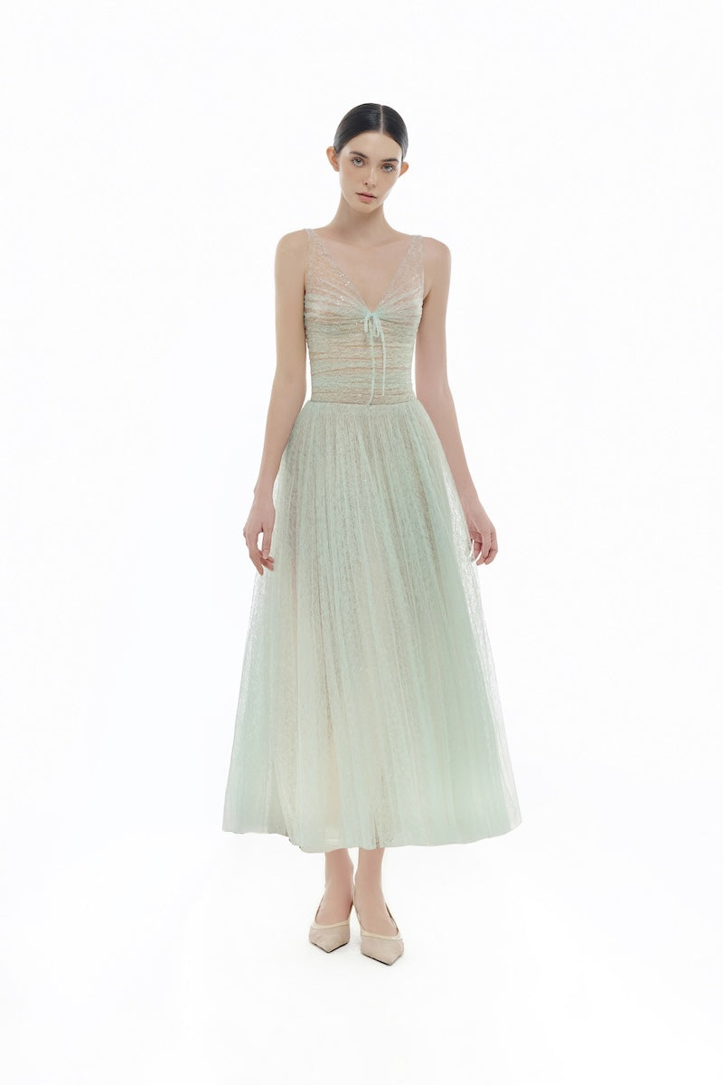 Mint V-neck draped gown by Montsand, featuring elegant midi length and flowing fabric, perfect for formal occasions.