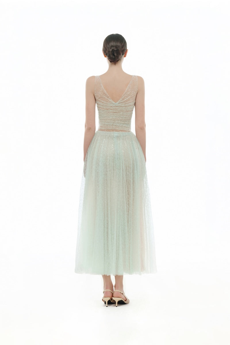 Mint V-neck draped midi dress by Montsand, featuring a flowy, elegant design with soft fabric and a stylish V-neckline.