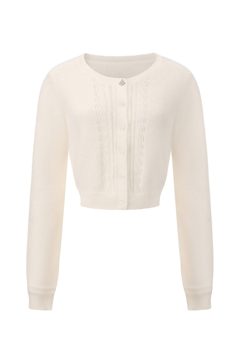 White knitted Mirabelle cardigan by Nana Jacqueline, featuring a cozy, stylish design with a button-up front and ribbed details.