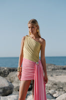 Gigii's Mirage mini dress featuring a stylish design, perfect for casual or evening wear, shown on a model.